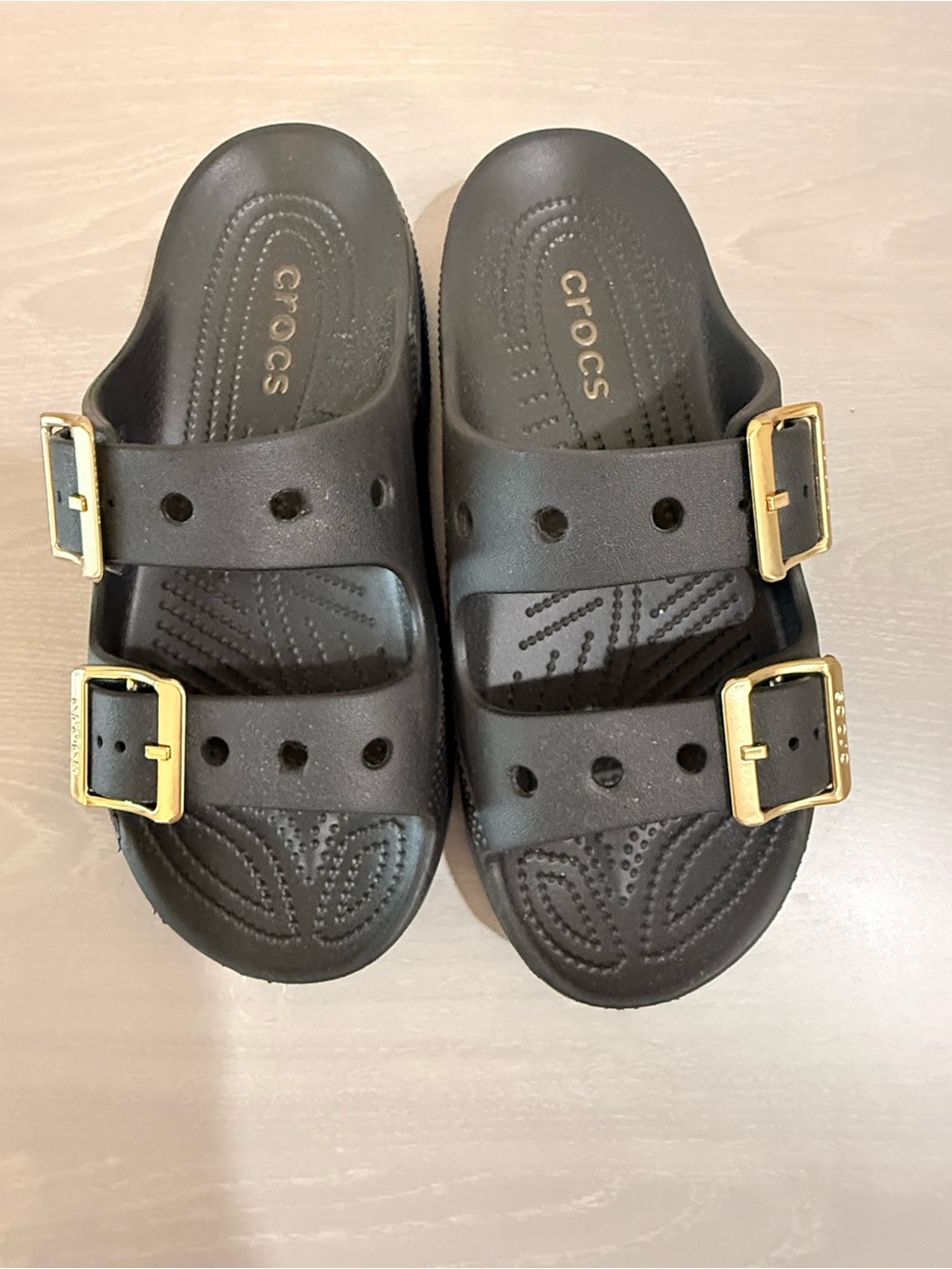 Crocs Black Sandals with Gold Buckles